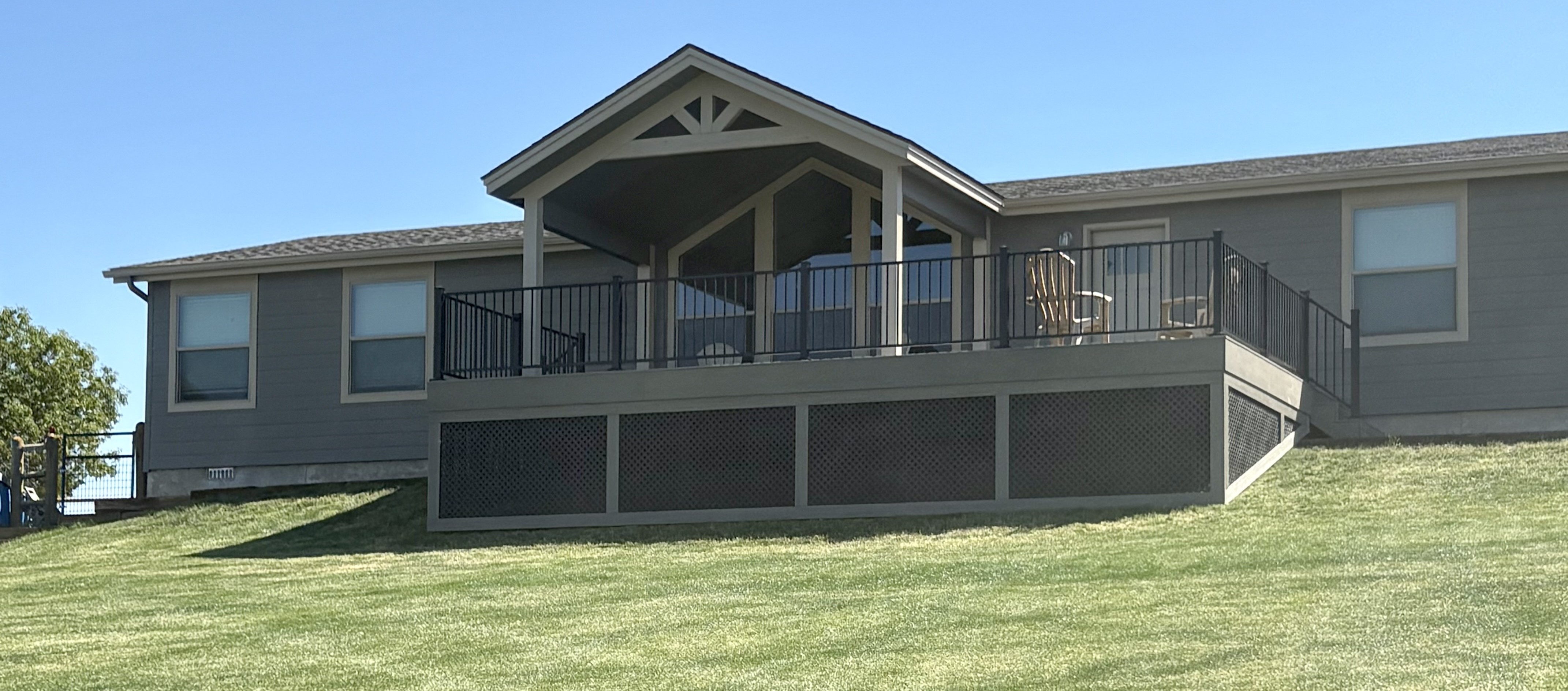 Charming covered deck after the transformation